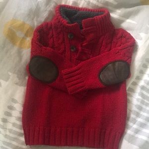 Red, cozy toddler sweater.